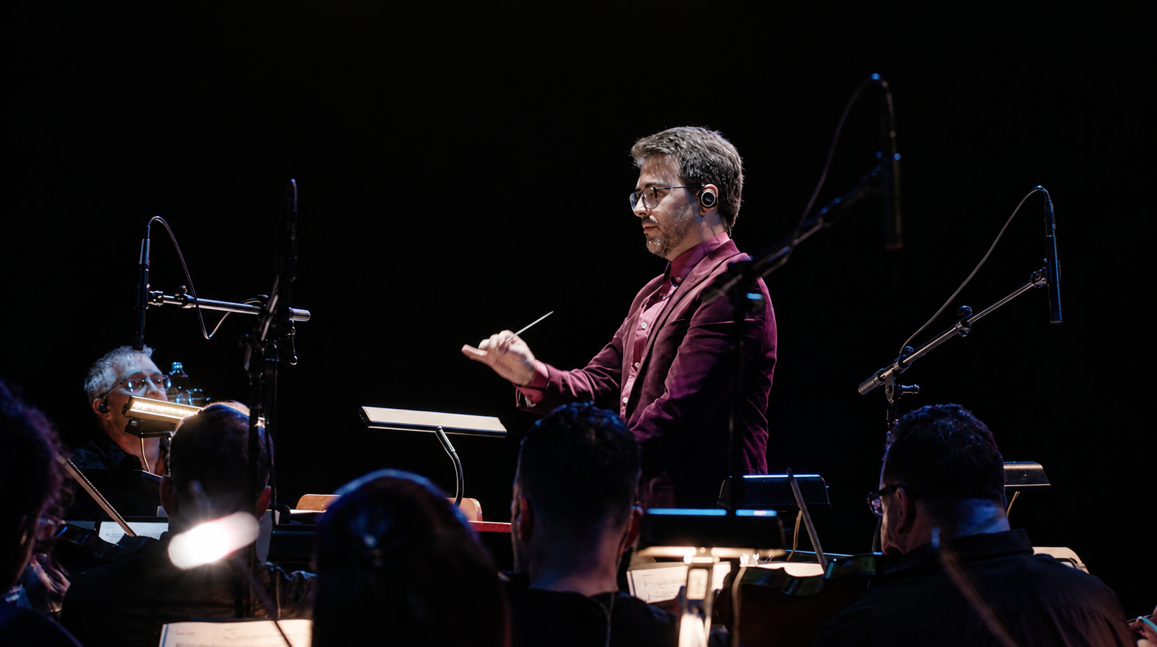 Graham Foote conducting during a recording session